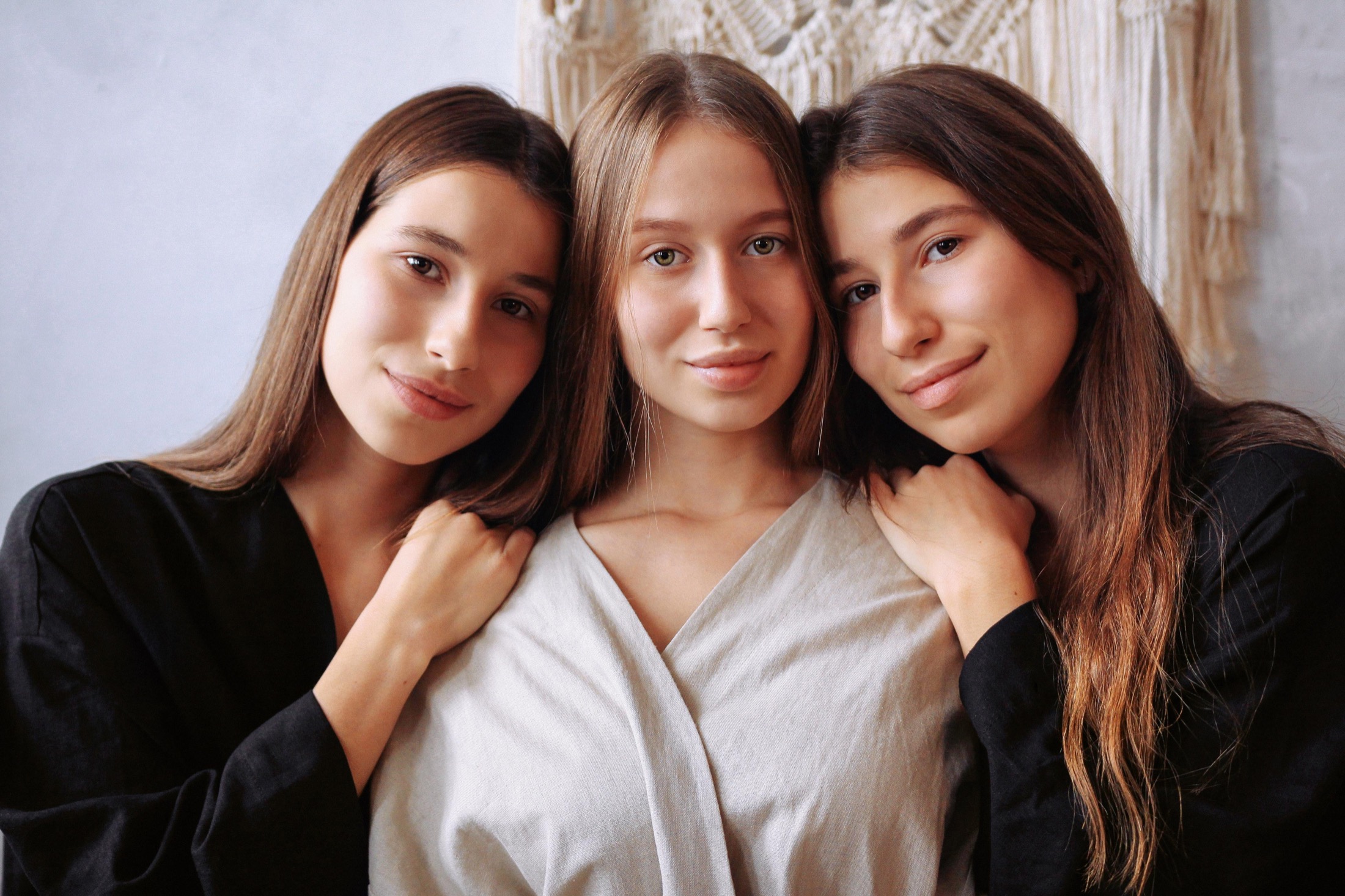 Three models wearing Veresk Clothes robes