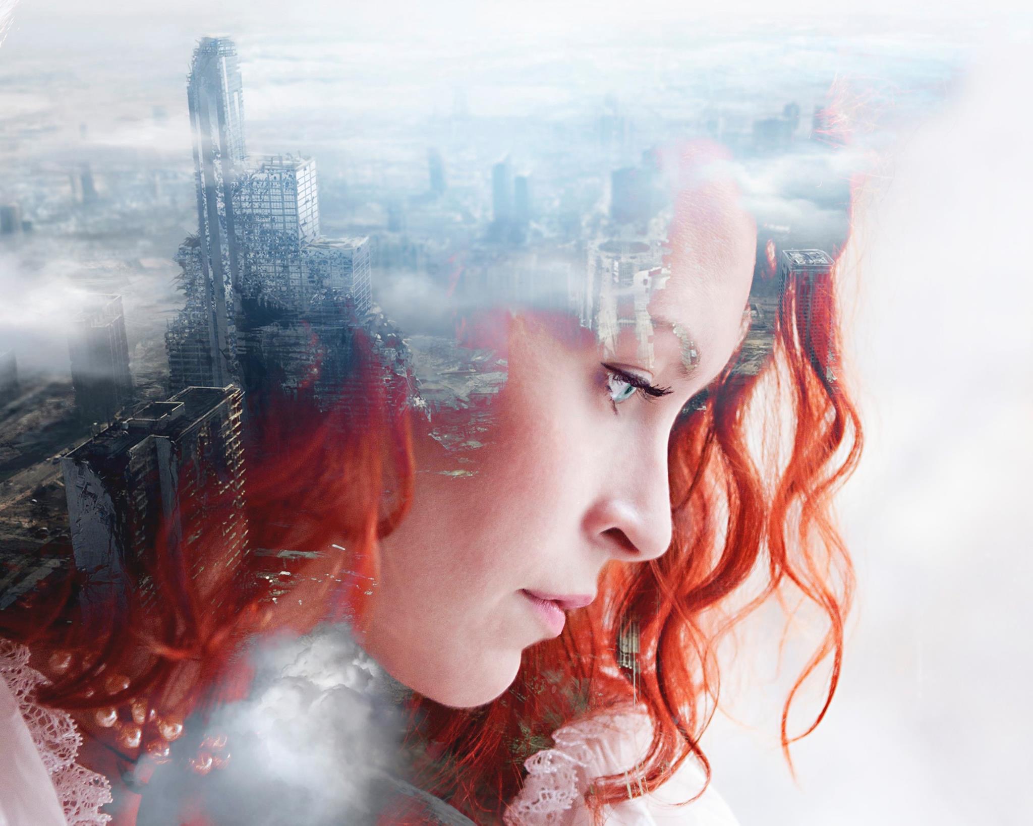 Layered fine art portrait with city textures and red hair